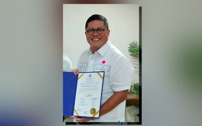 <p>Bicol Saro Party-list first nominee Brian Raymund Yamsuan <em>(Photo courtesy of Office of Comelec chairperson George Garcia)</em></p>