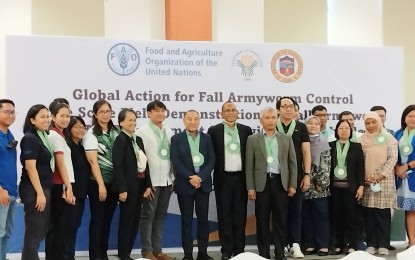 <p><strong>LAUNCHING</strong>. Officials of the Department of Agriculture and Bureau of Plant Industry pose during the launching of the Global Action Large Scale Field Demonstration of Fall Armyworm Management Strategies and Technologies on Feb. 21 in Calasiao town, Pangasinan. The demonstration will be held in San Carlos City, Binalonan, Calasiao and Sta. Barbara towns on Feb. 22 to 23. <em>(PNA)</em></p>