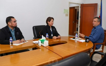 <p>Civil Service Commission Commissioner Aileen Lizada (center) and Philippine Sports Commission Chairman Richard Bachmann (right)<em> (Photo courtesy of Philippine Sports Commission)</em></p>