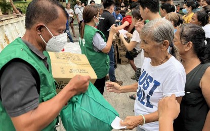 <p><strong>FIRE VICTIMS</strong>. More than a thousand fire victims, including an elderly woman, in Quezon City line up to receive aid from the Office of the Vice President on Monday (Feb. 20, 2023). The OVP said around 500 families were affected by the fire incident. <em>(Photo courtesy of the Office of the Vice President)</em></p>