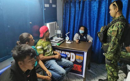 <p><strong>HUMAN TRAFFICKING.</strong> Authorities rescue 16 victims of human trafficking, including three minors, in Bongao, the capital town of Tawi-Tawi province, on Tuesday (Feb. 21, 2023). The victims were en route to Malaysia, where they were supposedly promised jobs by a certain Jason.<em> (Photo courtesy of APC-WM)</em></p>