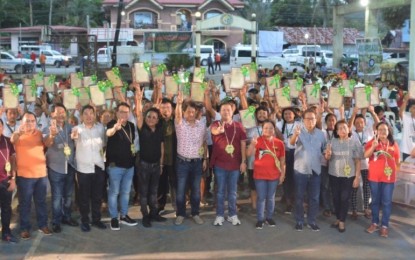 <p><strong>LANDOWNERS</strong>. Some 175 farmers in the province of Aklan are now legitimate landowners after receiving their electronic land titles from Agrarian Reform Secretary Conrado Estrella III. Other farm support machinery and equipment were also distributed by DAR to ensure the ARBs' success.  <em>(Photo courtesy of DAR) </em></p>