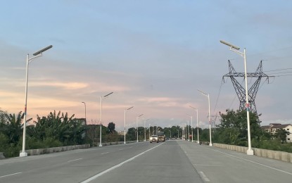 <p><strong>SOLAR LAMP POSTS</strong>. Solar-powered street lights line up the bypass road in Laoag City, Ilocos Norte province in this undated photo. The city government plans to extend the lighting project down to the barangays, with PHP19 million in initial funding. <em>(Photo by Leilanie Adriano)</em></p>