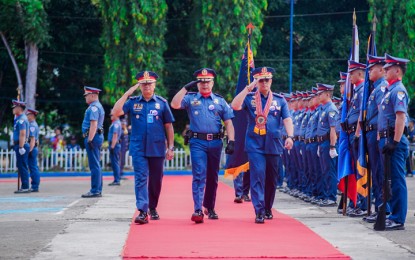 <p><strong>PNP CHIEF VISIT.</strong> Philippine National Police chief Gen. Rodolfo Azurin Jr., (with cloth garland) lauds the officers and men of the Police Regional Office-Zamboanga Peninsula for promoting peace in the region. Azurin visited the PRO-9 headquarters Thursday (Feb. 23, 2023) to lead the awarding of medals to eight officers and 10 policemen for outstanding performance. <em>(Photo courtesy of PRO-9)</em></p>