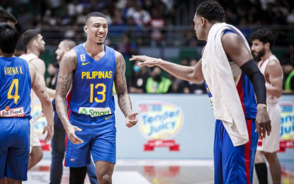 <p><strong> BIG WIN</strong>. Justin Brownlee and Jamie Malonzo celebrate as Gilas Pilipinas defeated Lebanon, 107-96, in sixth window of the FIBA World Cup Qualifiers at the Philippine Arena in Bocaue, Bulacan on Friday (Feb. 24, 2023). Bronwlee and Malonzo led Gilas with 17 and 15 points each. <em>(Photo courtesy of FIBA)</em></p>