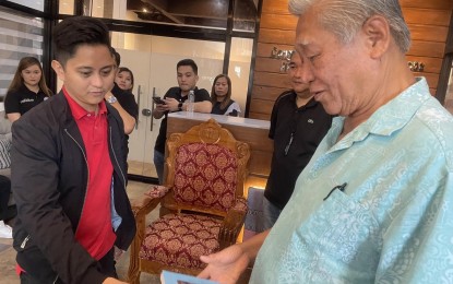 <p><strong>NEW BOOK</strong>. Ilocano book author Ric Agnes (right) pays a courtesy visit to Ilocos Norte Rep. Ferdinand Alexander "Sandro" Araneta Marcos III on Friday (Feb. 24, 2023). Agnes is set to release a new book on Rep. Marcos' grandfather, former President Ferdinand E. Marcos Sr. <em>(Photo by Leilanie Adriano)</em></p>