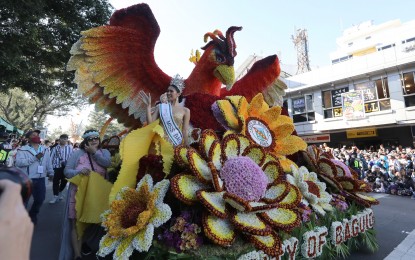 <p><strong>FLORAL SHOW</strong>. The float of the city of Baguio was the first to parade during the highlight event of Panagbenga 2023 on Sunday (Feb. 26, 2023). The parade traversed Session Road and ended at the Melvin Jones football field. <em>(PNA photo by Joey Razon)</em></p>