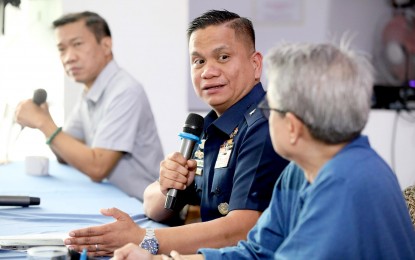 <p><strong>PROTECTING PH EEZ.</strong> Commodore Jay Tarriela (center), Philippine Coast Guard spokesperson for the West Philippine Sea, discusses how they defend the country’s exclusive economic zone in the disputed waters during the Saturday News Forum in Dapo Restaurant, Quezon City on Feb. 25, 2023. In a statement Thursday (Sept. 14), Tarriela said he was "disheartened" to hear doubts about the PCG's capabilities to protect the country's exclusive economic zone.<em> (PNA photo by Avito Dalan)</em></p>