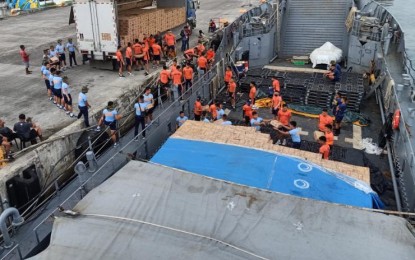 <p><strong>RELIEF GOODS.</strong> Personnel from the Philippine National Police, Coast Guard, and Naval Reservists join hands in unloading the 68 tons of family food packs in a pier in Ormoc City, Leyte after being successfully shipped from the Naval Base Rafael Ramos in Lapu-Lapu City, Cebu to Ormoc City by the BRP Batak (LC 299). Naval Forces Central public affairs head Lieutenant Michael John Savillo on Tuesday (Feb. 28, 2023) said the relief goods are intended for the families who were victims of flooding in Eastern Visayas. <em>(Photo courtesy of Navforcen) </em></p>