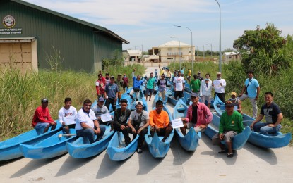 <p><strong>LIVELIHOOD AID</strong>. The Bureau of Fisheries and Aquatic Resources-Central Luzon awards 50 fiberglass reinforced plastic boats to fishermen in the towns of Lubao and Sasmuan in Pampanga on Tuesday (Feb. 28, 2023). The boats were personally crafted by the fishers who were trained and given raw materials by BFAR through its program “Bangka Mo, Gawa Mo."<em> (Photo courtesy of BFAR-Central Luzon)</em></p>