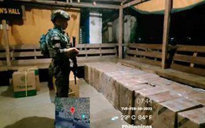 <p><strong>SMUGGLED CIGARETTES.</strong> Police and Bureau of Customs personnel arrest three suspects and seize more than P1.3 million worth of smuggled cigarettes near Manalipa Island, Zamboanga City, on Tuesday evening (Feb. 28, 2023). The smuggled cigarettes came from Jolo, Sulu, and were bound for Cotabato City when seized by the authorities.<em> (Photo courtesy of 2nd Zamboanga City Mobile Force Company)</em></p>