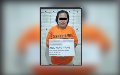 <p><strong>ARRESTED REBEL.</strong> Police and Army operatives arrest a communist insurgent identified only as "Yangyang, during an operation Tuesday (Feb. 28, 2023) in Sitio Bokbokon, Las Nieves town, Agusan del Norte province. The rebel has a standing arrest warrant for multiple attempted murder charges in Malaybalay City, Bukidnon.<em> (Photo courtesy of ADNPPO)</em></p>