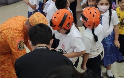 <p><strong>FIRE PREVENTION</strong>. Learners in San Jose de Buenavista queue up for the Antik Fire Square Show at the Robinsons Place Antique as part of the Fire Prevention Month celebration on Thursday (March 2, 2023). Bureau of Fire Protection - Antique fire marshal Supt. Patricio G. Collado said in an interview that the municipal fire stations are formulating their respective Community Fire Protection Plans. <em>(PNA photo courtesy of BFP-Antique)</em></p>