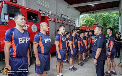 <p><strong>FIRE PREVENTION.</strong> Chief Supt. Adel Bautista, Bureau of Fire Protection (BFP) Eastern Visayas director, talks with firemen in Tacloban City in this undated photo. At least 16 towns in Eastern Visayas still lack firefighting facilities and manpower, the BFP reported on Thursday (March 1, 2023). (<em>Photo courtesy of BFP Region 8)</em></p>