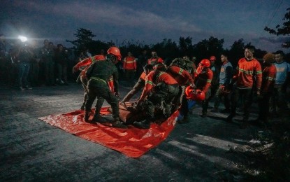 Bodies of plane crash victims brought down from Mt. Mayon