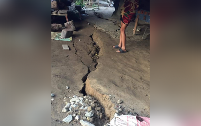 <p><strong>TREMOR, AFTERSHOCKS.</strong> Ground cracks and landslides are seen in Maragusan town, Davao de Oro province after the magnitude 5.3 tremor that shook the province on Monday morning (March 6, 2023). More than 30 aftershocks were recorded by the provincial disaster risk reduction management office.<em> (Photo courtesy of Chan Aeron Comania)</em></p>