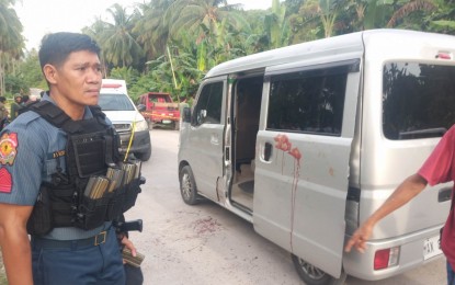 <p><strong>AMBUSHED.</strong> Police cordon off the minivan driven by resort security officer Regan Blanan with his family after an afternoon ambush in Barangay Tapian, Datu Odin Sinsuat, Maguindanao del Norte on Monday (March 6, 2023). Blanan and two other members of his family were wounded in the attack. <em>(Photo courtesy of DXMS-Cotabato)</em></p>