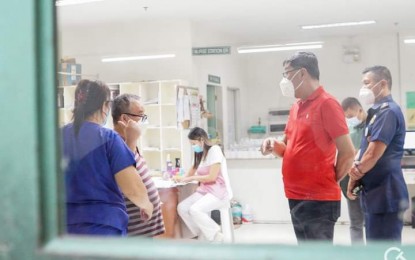 <p><strong>LIFTED</strong>. Mayor Renato Gustilo (2nd from right) checks the situation of amoebiasis patients at San Carlos City in Negros Occidental province on the third week of February. On Tuesday (March 7, 2023), Gustilo lifted the state of health emergency in the city after a decrease in active diarrheal cases. <em>(Photo courtesy of Rene Gustilo Facebook page)</em></p>
