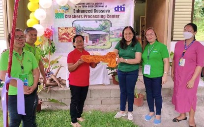 <p><strong>IMPROVED PROCESSING.</strong> Officials of the Department of Agrarian Reform in North Cotabato province turn over on March 1, 2023 the upgraded processing facility to Barangay Katipunan Farmers Association (BFKA) in M'lang town to increase their cassava production. The group aims to add value to their crops and produce quality cassava chips. <em>(Photo courtesy of DAR-North Cotabato)</em></p>