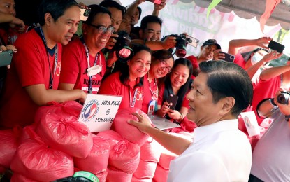 <p><strong>LOWER PRICES</strong>. President Ferdinand R. Marcos Jr. meets with rice traders at a "Kadiwa ng Pangulo" outlet at the Trade Union Congress of the Philippines compound in Diliman, Quezon City on March 8, 2023. National Food Authority rice retailed for PHP25 per kilo. <em>(PNA photo by Rey S. Baniquet)</em></p>
<p> </p>