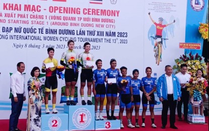 <p><strong>THIRD PLACE.</strong> The Philippine women's road team shares the podium with two Vietnamese squads during the 13th Binh Duong Women's Cycling Championship - Biwase Cup 2023 Stage 1 awarding ceremony in Vietnam on Wednesday (March 8, 2023). Biwase Cup is held annually in celebration of International Women’s Day. <em>(Contributed photo)</em></p>
