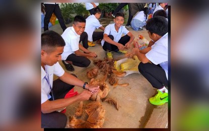 <p><strong>DONATIONS</strong>. Learners of the Caluya National High School donate coconut husks and plastic bottles for the improvised oil spill booms in the affected barangays of Caluya town, Antique province on Tuesday (March 7, 2023). The Tobias Fornier municipality also donated 10 sacks of human hair to be converted into oil spill booms.<em> (Photo courtesy of Antique PIO)</em></p>
