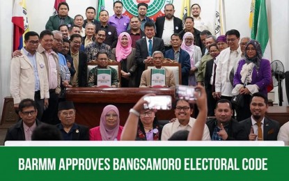 <p><strong>ELECTORAL CODE.</strong> Bangsamoro Autonomous Region in Muslim Mindanao (BARMM) lawmakers pose for a photo after the passing into law of the region’s electoral code past Wednesday midnight (March 9, 2023). The BARMM electoral code is the fourth of seven priority measures approved by regional lawmakers for implementation.<em> (Photo courtesy of BTA-BARMM)</em></p>