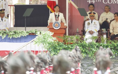 <p><strong>NEW BREED.</strong> Pres. Ferdinand R. Marcos Jr. speaks at the 44th commencement exercises of the Philippine National Police Academy Masidtalak Class of 2023 at the Camp General Mariano Castañeda in Silang town, Cavite province on Friday (March 10, 2023). Marcos called on the graduates to become the catalysts for restoring public trust in the country's police force. <em>(PNA photo by Alfred Frias)</em></p>