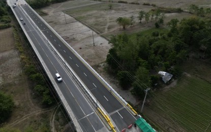 <p><strong>NEW BRIDGE.</strong> An aerial photo of the newly-constructed bridge in Paniqui, Tarlac which was formally opened to motorists and commuters on Friday (March 10, 2023). The Department of Public Works and Highways implemented the multi-year project with a total funding of PHP237.97 million. <em>(Photo courtesy of DPWH Region 3)</em></p>