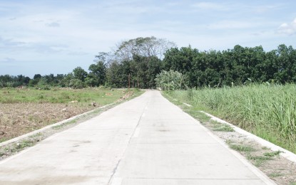 <p><strong>FARM-TO-MILL ROAD</strong>. The newly completed PHP5.1 million farm-to-mill road in barangays Cabadiangan and Mambagaton Himamaylan City, Negros Occidental. The 312-meter road facilitates convenient transport of agricultural products to various locations and access to neighboring cities and towns. <em>(Photo courtesy of DPWH-6)</em></p>