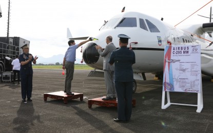 <p><strong>ENHANCEMENT.</strong> President Ferdinand R. Marcos Jr. (2nd from left) graces the joint acceptance, turnover, and blessing of land and air assets acquired by the Philippine Air Force at the Cesar Basa Air Base in Floridablanca, Pampanga in November 2022. The base will undergo a USD24-million airstrip extension and rehabilitation project beginning March 20, 2023 under the Philippine-US Enhanced Defense Cooperation Agreement. <em>(PNA file photo)</em></p>