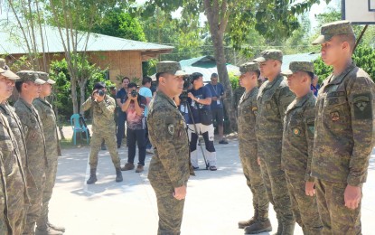 <p><strong>SEND OFF</strong>. Lt. Col. Roderick Salayo (center), commanding officer of the 11th Infantry Battalion of the Philippine Army, reminds troops who will be deployed for joint security checkpoints in Negros Oriental. The move comes following the creation of Task Force Negros as ordered by President Ferdinand Marcos Jr to address lawlessness, criminality and violence and arrest the mastermind in the killing of Gov. Roel Degamo and eight others, (<em>Photo by Judy Flores Partlow)</em></p>