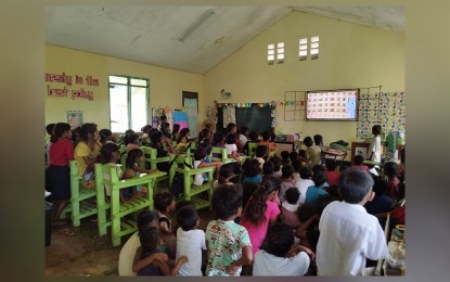 <p><strong>IRAYA MANGYAN LEARNERS</strong>. Iraya Mangyan learners watch the visual presentation in a classroom in Occidental Mindoro province in this pre-pandemic undated photo. The Indigenous Peoples Education teachers said Iraya Mangyan learners are very eager to learn despite challenges in resources.<em> (Photo courtesy of Divina Casison)</em></p>