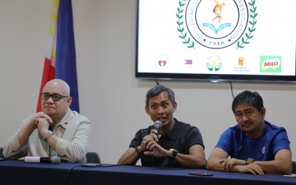 <p><strong>ALL SET.</strong> Philippine Athletics Track and Field Association secretary general Edward Kho (center) talks about the Philippine Athletics Championships during the Philippine Sportswriters Association Forum at Rizal Memorial Sports Complex in Manila on Tuesday (March 14, 2023), flanked by Philippine Racing Commission chair Reli de Leon (left) and national team head coach Jojo Posadas. Some 800 athletes, including 80 foreign entries, are participating in the March 21 to 26 event in Ilagan City, Isabela. <em>(PNA photo by Jess Escaros Jr.)</em></p>