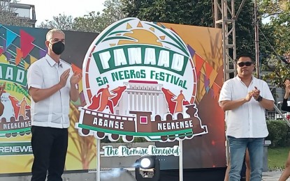 <p><strong>LAUNCHING</strong>. Negros Occidental Governor Eugenio Jose Lacson (left) and Vice Governor Jeffrey Ferrer unveil the logo for the 2023 Panaad sa Negros Festival themed "The Promise Renewed" during the launching event held at Capitol Lagoon and Park in Bacolod City on Tuesday afternoon (March 14, 2023). Set from April 17 to 23 at the Panaad Park and Stadium, the festival returns after a three-year hiatus due to the Covid-19 pandemic. <em>(PNA photo by Nanette L. Guadalquiver)</em></p>