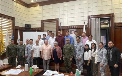 <p><strong>JOINT EXERCISE</strong>. Members of the Sangguniang Panlalawigan of Ilocos Norte pose for a photo with officials in-charge of the Philippine-US Balikatan Exercise 2023 after their courtesy call in the province on Jan. 23, 2023. The live fire exercise, which was earlier planned to be held in Burgos, Ilocos Norte, has been moved to Zambales instead. <em>(File photo by Leilanie Adriano)</em></p>
