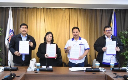 <p>(From left to right): National Housing Authority (NHA) National Capital Region (NCR) West Sector Office OIC Daniel R. Cocjin Daniel R. Cocjin; NHA NCR North Sector Office Regional Manager Jovita G. Panopio; Department of Public Works and Highways (DPWH) Senior Undersecretary Emil K. Sadain; and DPWH Project Director Ramon A. Arriola III of the Unified Project Management Office Flood Control Management Cluster. <em>(Photo from DPWH)</em></p>
