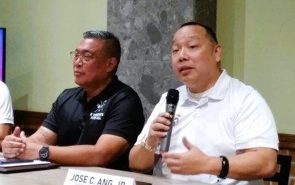 <p><strong>EVENT LAUNCHING.</strong> National Masters and Seniors Athletics Association of the Philippines (NMSAAP) president Jose Ang Jr. (right) discusses the 5 Throws-For-All Philippine Masters Athletics Championships during the tournament's formal launching at the To Ho Panciteria Antigua in Binondo, Manila on Friday, March 17, 2023. With him is lawyer Alberto Agra, 5 Throws-For-All program executive director. <em>(PNA photo by Jean Malanum)</em></p>