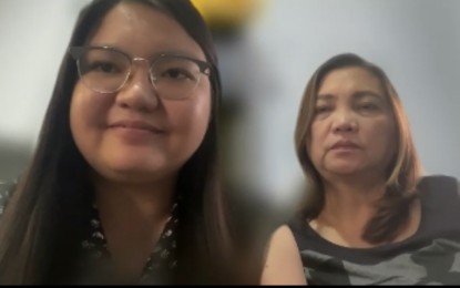 <p><strong>TOPNOTCHER</strong>. Screenshot of Dr. Aira Cassandra Castro and her mom Judith via Zoom conference on Friday (March 17, 2023). Castro topped the 2023 Physician Licensure Examination with a rating of 89 percent. <em>(Courtesy of MMSU)</em></p>