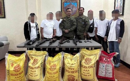 <p><strong>ASG BANDITS.</strong> Six Abu Sayyaf Group (ASG) bandits surrender and turn in high-powered firearms to military authorities in Patikul town, Sulu province on Wednesday (March 15, 2023). Maj. Gen. Ignatius Patrimonio, the Army's 11th Infantry Division (ID) commander, says the ASG surrenderers initially received cash and food assistance from the 32nd Infantry Battalion.<em> (Photo courtesy of 11ID)</em></p>