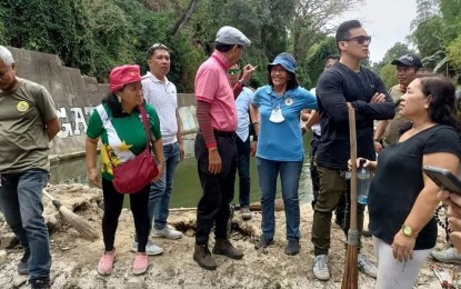 <p><strong>BIOFENCED.</strong> Cebu City Mayor Michael Rama leads the installation of biofence in one of the eight barangays on Saturday (Mar. 18, 2023).  (<em>Photo courtesy of the office of City Mayor Michael Rama)</em></p>