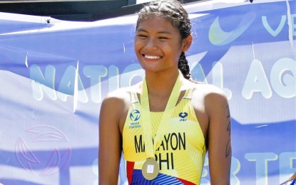 <p><strong>CEBU PRIDE.</strong> Karen Andrea Manayon of Talisay, Cebu, captures the gold medal in the women's elite category of the National Aquathlon Open and Super Tri Kids Championships at Ayala Vermosa Sports Hub in Imus, Cavite on Sunday (March 19, 2023). Provincemate Matthew Justine Hermosa ruled the men's side. <em>(PNA photo by Jean Malanum)</em></p>