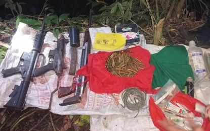 <p><strong>RECOVERED</strong>. A New People's Army (NPA) rebel who surrendered led government troops to the location of high-powered firearms buried in Juban town, Sorsogon province on Sunday (March 19, 2023). A drum was recovered, containing an M-1 carbine, an AR-9, a KG-9, a Molotov, 350 rounds of ammunition for the M16, a 10-meter cable used for explosives and medical paraphernalia.<em> (Photo courtesy of 9ID)</em></p>