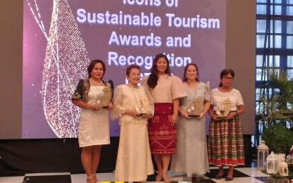 <p><strong>ROLE MODELS</strong>. Tourism Western Visayas Regional Director Crisanta Marlene P. Rodriquez (center) poses with the four awardees of the first Icons of Sustainable Tourism Awards and Recognition (ISTaR) awardees during their awarding ceremony held at the Casa Real in Iloilo City on Monday (March 20, 2023). The search for ISTaR is also the highlight of the Department of Tourism’s celebration of National Women’s Month in Western Visayas. <em>(Photo courtesy of Tin Lunasco)</em></p>
