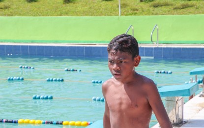<p><strong>PRODIGY</strong>. Jhon Rey Tayam eyes for gold during the provincial sports selection meet held in Luna, Apayao Ecotourism and Sports Complex last week. The new swimming prodigy of Apayao is set to compete in the Cordillera Administrative Region Athletic Association meet this April. <em>(Photo courtesy of JC Marquez-Provincial Government of Apayao)</em></p>