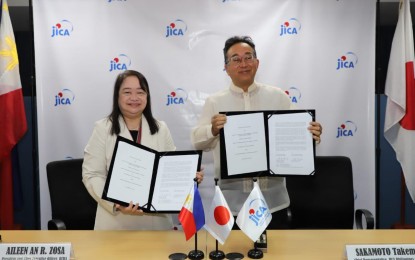 <p><strong>PARTNERSHIP.</strong> BCDA president and chief executive officer Aileen Zosa (left) and Japan International Cooperation Agency (JICA) Philippines chief representative Sakamoto Takema (right) sign a technical cooperation agreement at JICA Philippine office in Makati City on March 21, 2023 for the Capacity Enhancement for the Transport-Oriented Developments (TOD) Project. JICA will provide technical assistance to BCDA in crafting TODs in two major railway projects in the country traversing BCDA properties, such as Fort Bonifacio and the New Clark City. <em>(Photo courtesy of BCDA)</em></p>