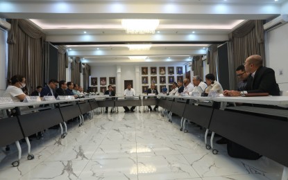 <p><strong>OIL SPILL INTER-AGENCY COMMITTEE.</strong> Justice Secretary Jesus Crispin Remulla (center) leads the meeting of the Oil Spill Inter-Agency Committee over the various issues surrounding the MT Princess Empress at the Department of Justice (DOJ) building in Manila on Thursday (March 23, 2023). The owner of the sunken vessel has been slapped with two cease and desist orders and is facing hefty fines over the contamination caused by the oil spill over a biodiverse area off the waters of Mindoro and neighboring islands. <em>(PNA photo by Yancy Lim)</em></p>