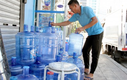<p><strong>WORLD WATER DAY</strong>. A store personnel prepares plastic water bottles for refilling at a water station in Barangay Socorro in Cubao, Quezon City on Wednesday (March 22, 2023). The World Meteorological Organization estimates that about 3.6 billion people worldwide struggle to have access to sufficient and clean water. <em>(PNA photo by Robert Oswald P. Alfiler) </em></p>