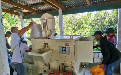 <p><strong>BROWN RICE MILL</strong>. Farmers in Dipaculao town, Aurora province check on the compact impeller brown rice mill provided to them by the Department of Science and Technology (DOST) in this undated photo. The recipient was the Calaocan Dipaculao Farmers Association.<em> (Photo courtesy of DOST Region 3)</em></p>