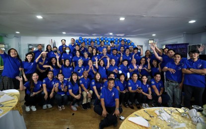 <p><strong>PNA AT 50. </strong>News and Information Bureau (NIB) Director Raymond Robert Burgos and NIB Assistant Director Lee Ann Pattugalan, and Philippine News Agency employees led by Executive Editor Demetrio B. Pisco Jr. pose during the celebration of the 50th PNA anniversary on Friday (March 24, 2023). <em>(PNA photo by Joey O. Razon) </em></p>